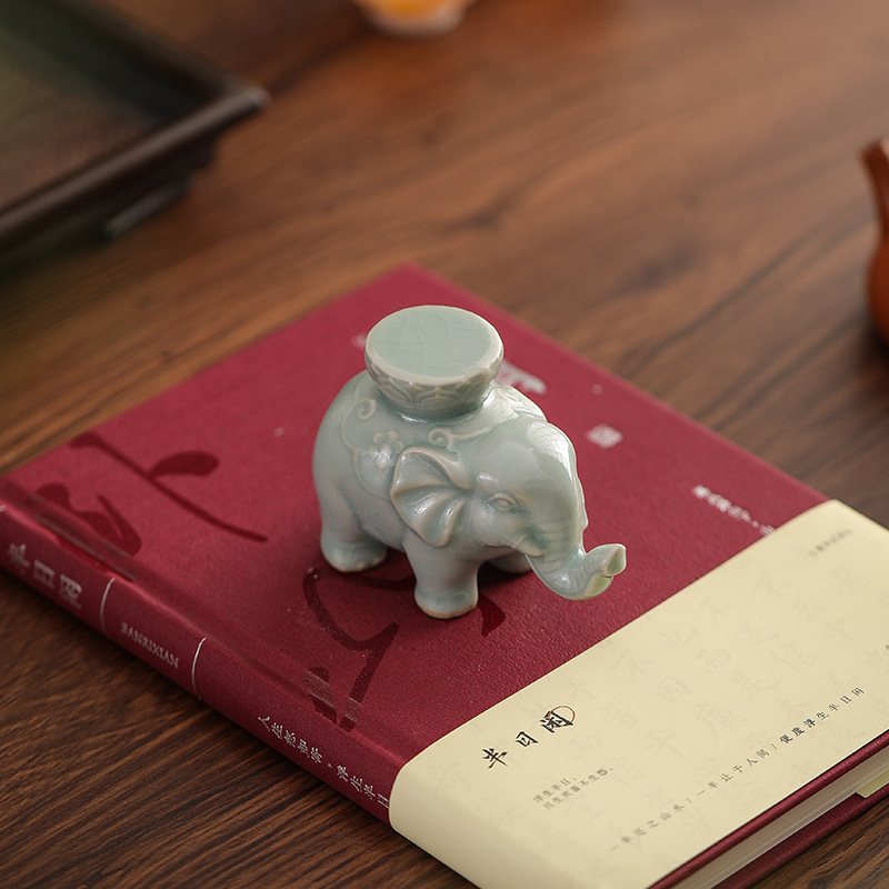 Creatieve olifant dekselhouder - Unique Table Accessories recensie en prijs